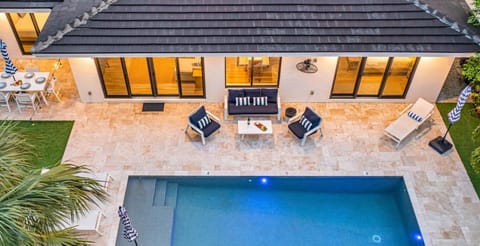 Relish the serenity of this most sought-after neighborhoods a short 10-minute walk or 2-minute golf cart ride to the beach.