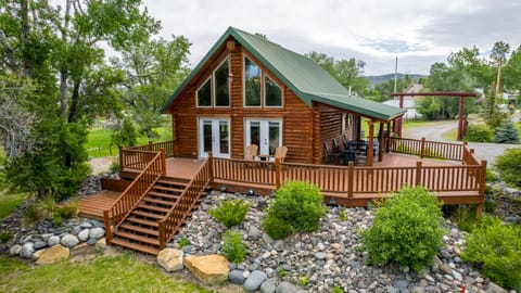 Log cabin next to river