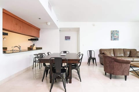 Cook, dine, and relax in this open-concept space with seating for six and a comfy lounge. Perfect for family vacations or group getaways near the beach and city hotspots.

