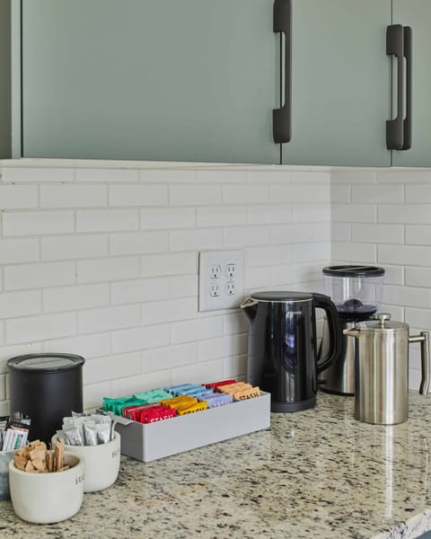 Help yourself to our complimentary selection of teas and locally-roasted coffee. We provide a burr grinder and a french press to help make a delicious cup of coffee.