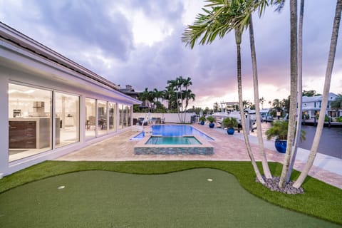 Waterfront pool, hot tub, & putting green.