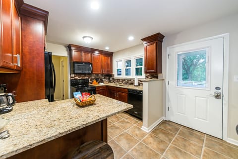 Entry leads to kitchen area