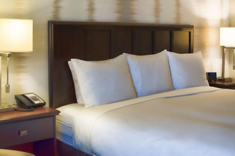 Bedroom with a comfortable King size bed. Interior and views may vary based on location and availability.