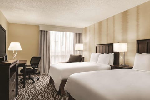 Unit with 2 comfy Double beds. Interior and views may vary based on location and availability.