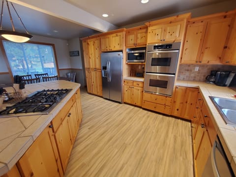 Closeup of cooking area of kitchen.