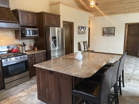 Kitchen with gas stove for those who love to cook, including Instant Pot.