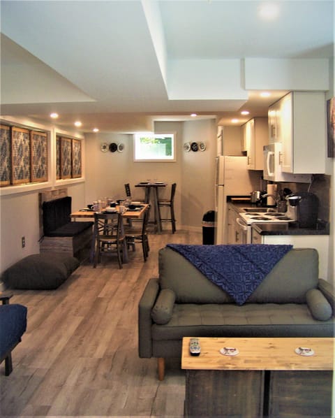 Open space with dining, kitchen, and lounging close by.
