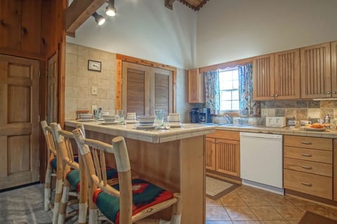 You can seat 3 at the kitchen bar.