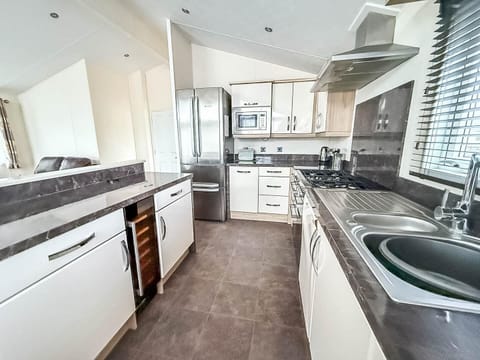 Bright, modern kitchen with ample counter space and natural light