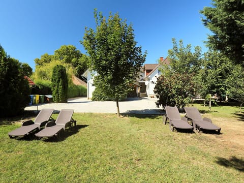 Sky, Plant, Property, Plant Community, Shade, Tree, Land Lot, Outdoor Furniture, Natural Landscape, Road Surface
