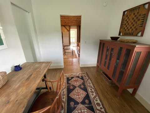 Office/den decorated with red pie chest