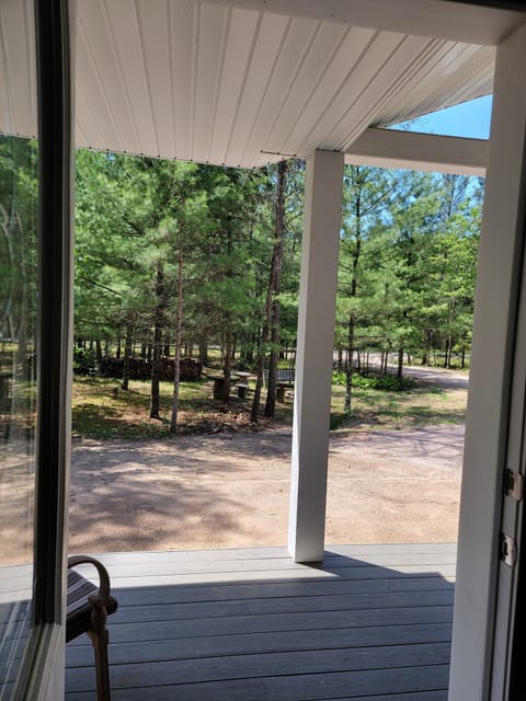 View from front door porch out to firepit