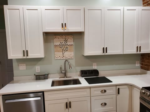 Plenty of cabinet space and kitchen tools