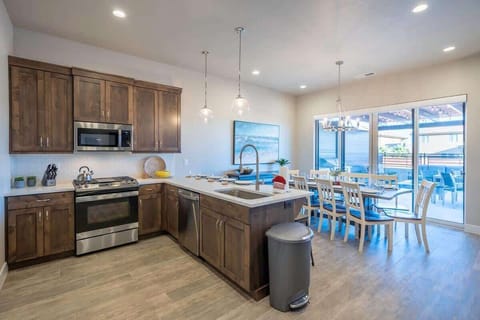 Nice custom kitchen with bar and dining table