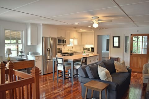 View of Kitchen and Family Room.  Family Room also has a Queen sleeper-sofa