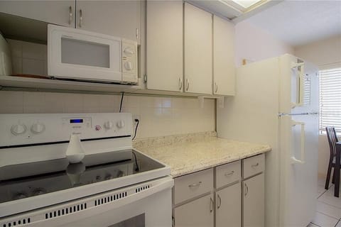 full size kitchen with pots, pans, plates, coffee pot etc. everything included.