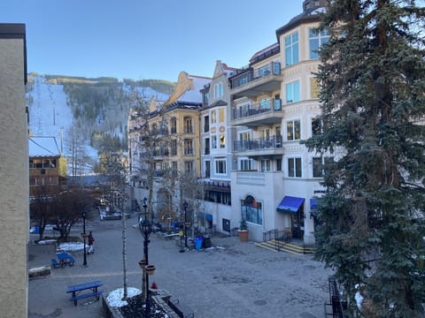 View of gondola from the balcony. 200 steps to mountain, location location!!