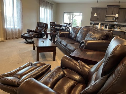 Recently-added leather recliners with detached ottomans! 