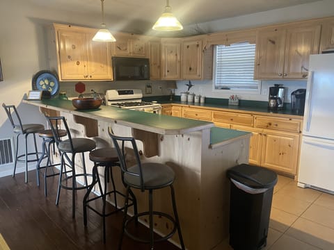 Fully furnished kitchen on the main level just three steps to the home.