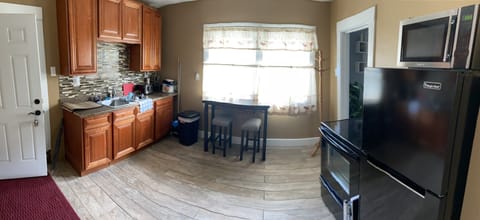 Beautiful Fully equipped kitchen with all utensils, pots, pans, dishes and etc.