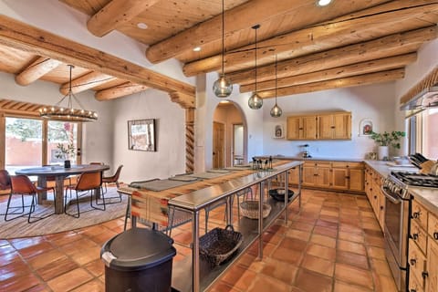 The dining area offers comfortable seating for 6 guests.