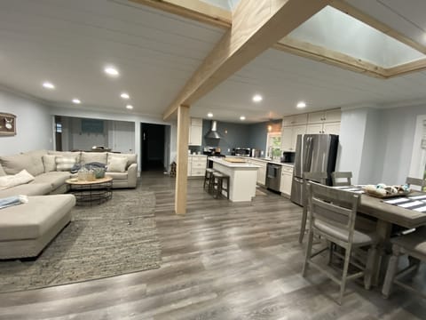 Open concept kitchen, living room ana dinning