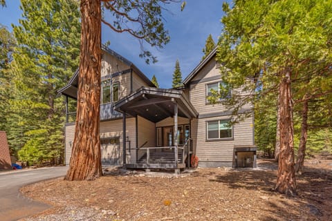 The house is located on a private street backing up to the Tahoe National Forest