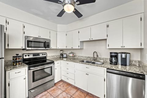 With sleek appliances and generous counter space, this kitchen makes vacation cooking feel like part of the fun.