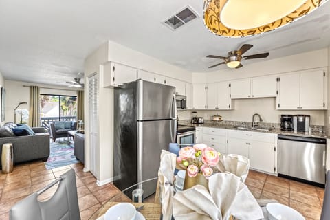 Classic coastal design meets full functionality in this warm, welcoming kitchen space.