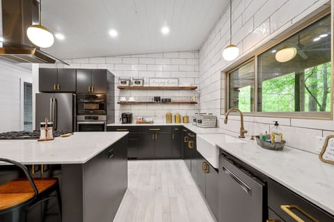 The white, black and gold decor is the epitome of modern luxury.