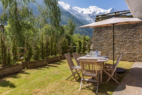 Dine al fresco at Pothecary apartment with Mont Blanc views