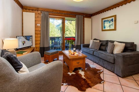 Comfy lounge leading onto balcony