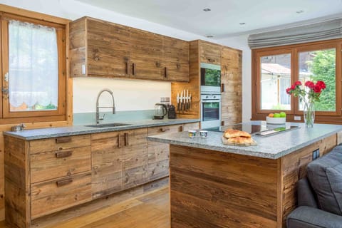 Catch the view of the Aiguille du Midi from next to the fridge!