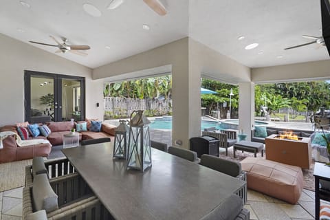 3 seating areas, outdoor TV, Copper gas firepit, boho sofa/daybed, formal dining