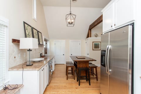 View of dining table from inside the kitchen 
