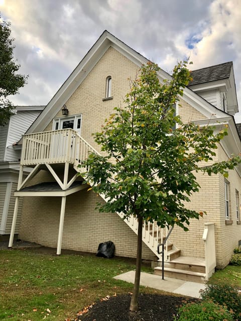 Private entrance and assigned parking spot in front