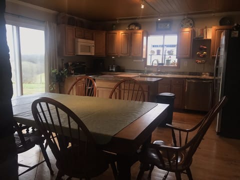 Breathtaking sliding glass door view. Prep island and double oven for your cooks
