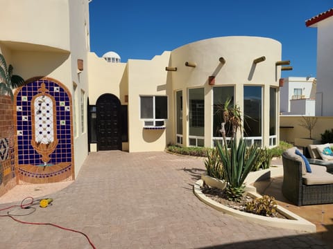 Private courtyard entry.
 Exterior shower. Shower the  Sand off and cool off.