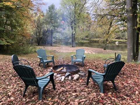Fall bonfire pit with river and beach view