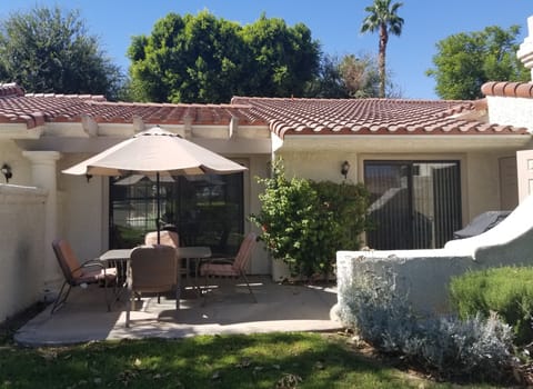 Cozy, semi-private, poolside. Cushions have been replaced, see photo following