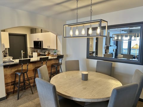 Newly remodeled dining area seats 6 with 3 more at the bar.