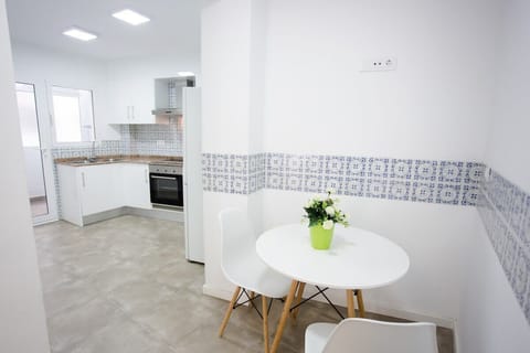 Small dining nook in the kitchen- perfect for a quick breakfast.