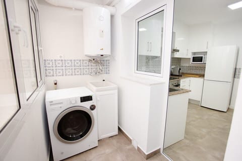 A washing machine and a brand-new water heater are available. 