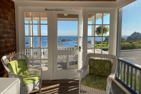 Screen porch facing west perfect for cocktails and sunset dinners