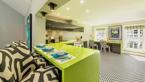 Additional seating can be found at the kitchen bar...