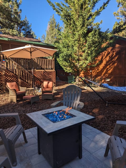 Enjoy your own outdoor hangout space with seating and a fire pit ideal for evening s'mores, stargazing, and mountain nights.