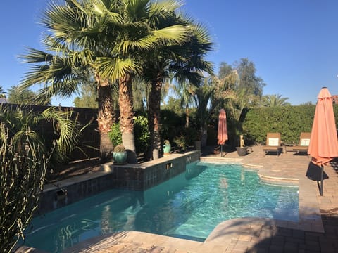 A beautifully landscaped backyard oasis.