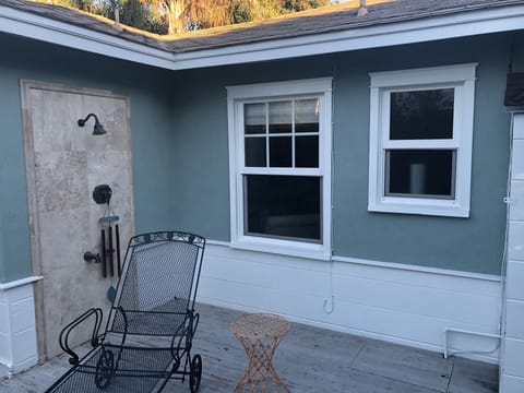 Rear view.  There is an outside shower if you get too sandy from the beach.  