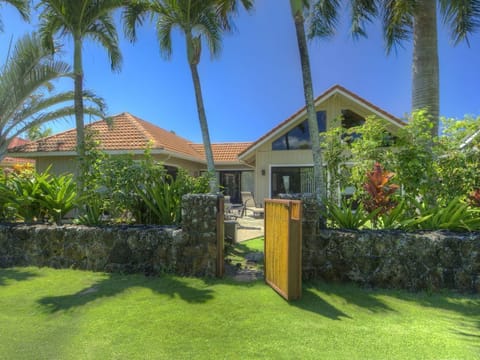 The backyard gate opens to a green belt for a short walk to beautiful beaches.