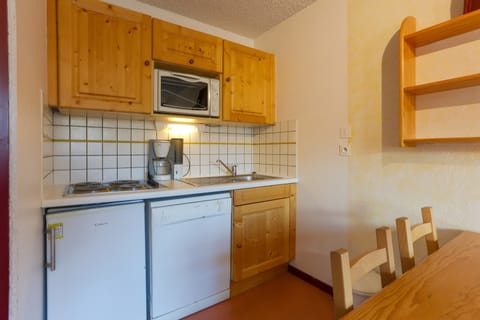 Curb your appetite by indulging in a snack in your kitchenette!